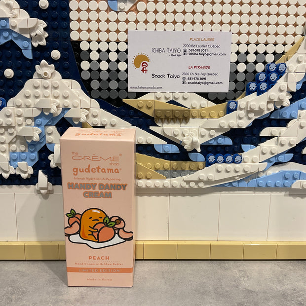THE CREME SHOP Crème pour les mains Gudetama Pêche 50ml