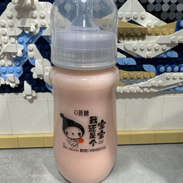 Boisson laitière biberon à la fraise