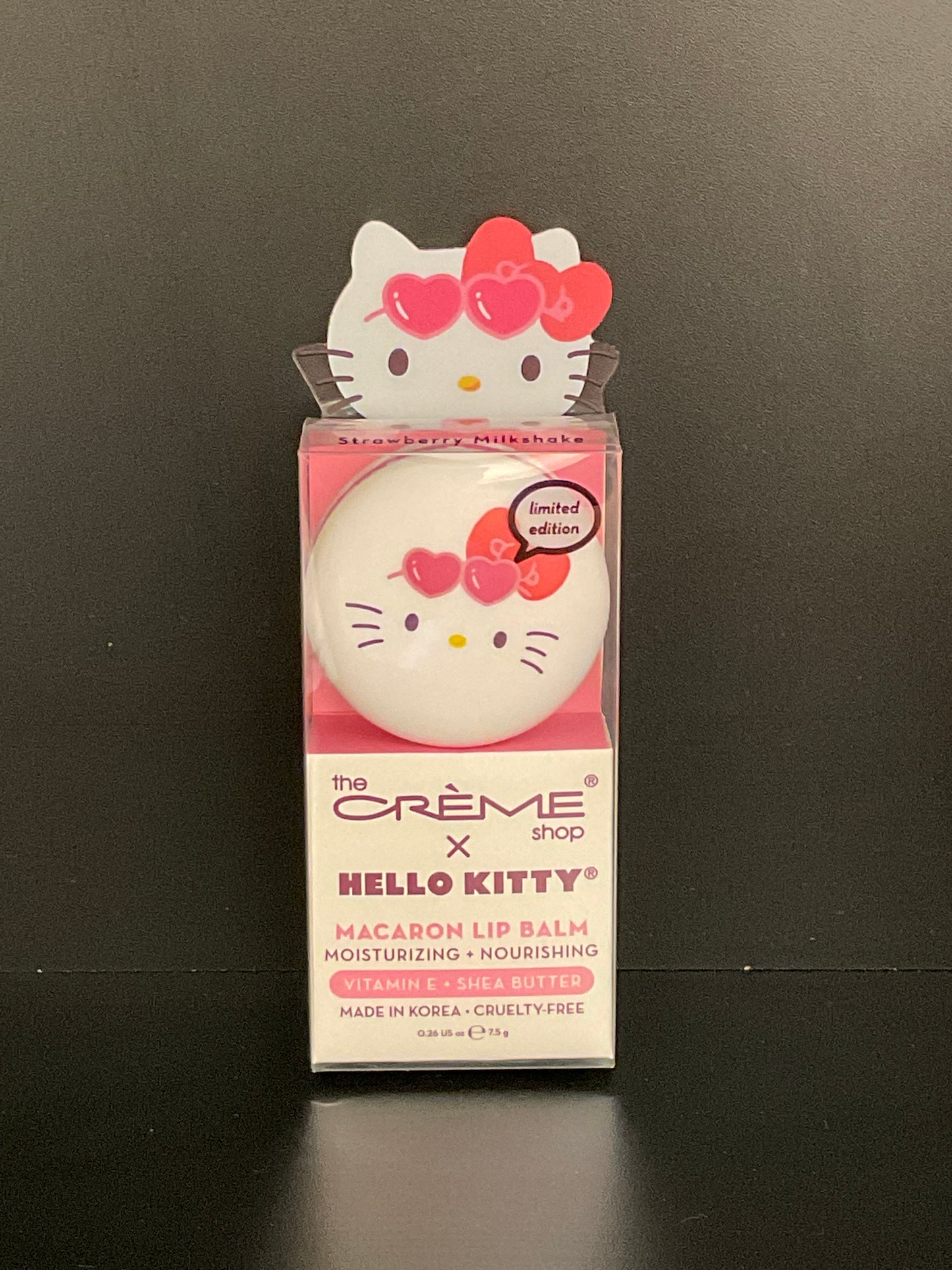 THE CREME SHOP Baume à lèvres Macaron Hello Kitty au Lait Frappé à la Fraise